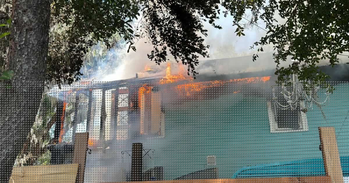 Fire crews respond after flames rip through Orlando home, officials say