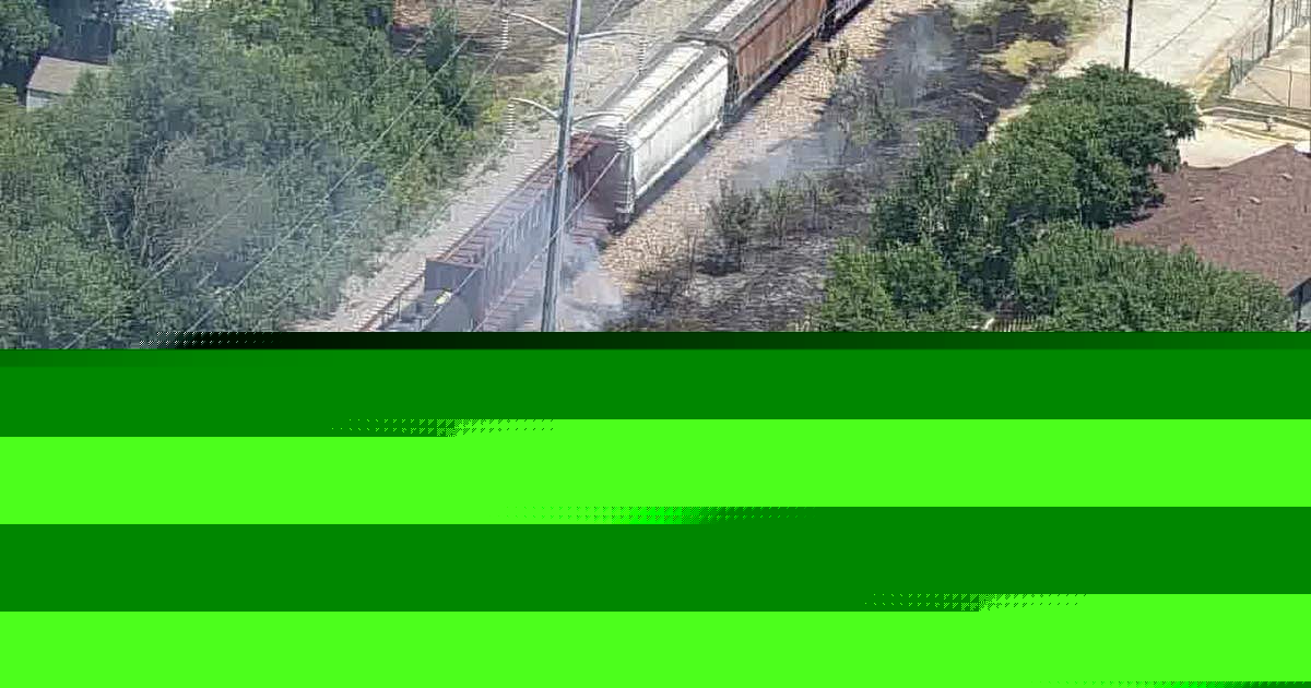 Fire burns along train tracks in Fort Worth