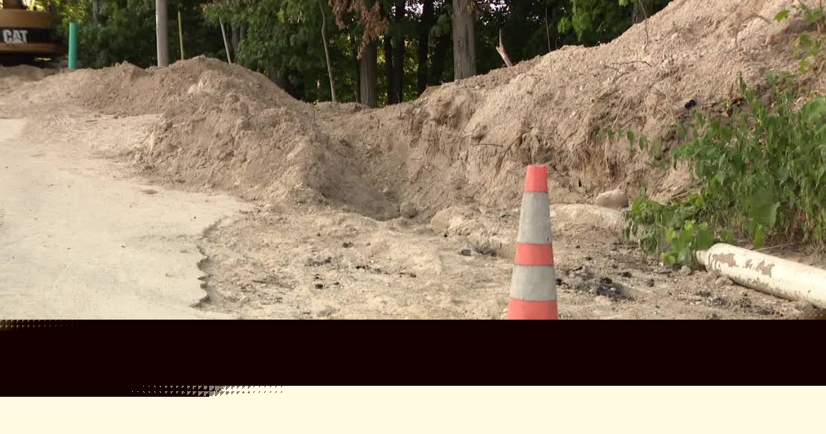 Elkhart Lake trench collapse rescue, worker buried up to his neck