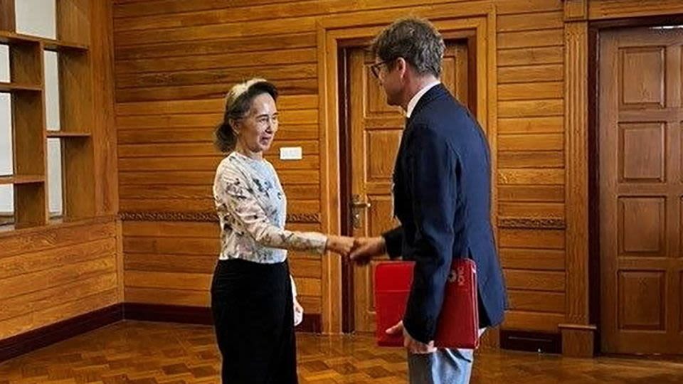Aung San Suu Kyi meets Red Cross official, after mounting demands the military prove she is still alive