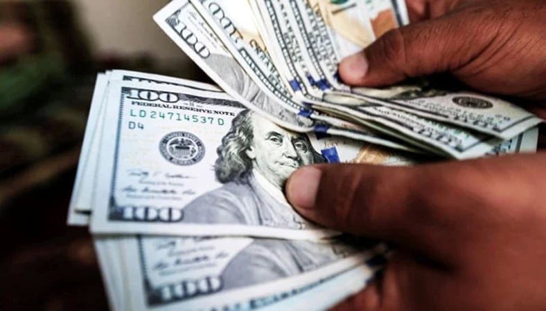 Rupee gains ground against dollar