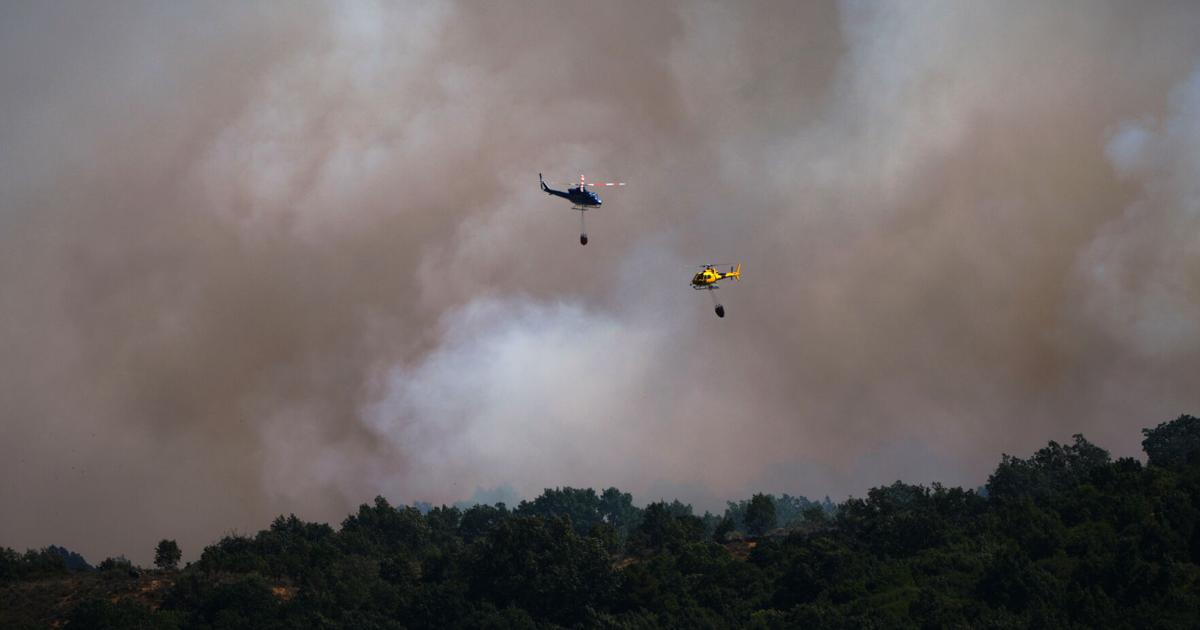 Europe battles fast-moving wildfires sweeping across Spain and France, in photos