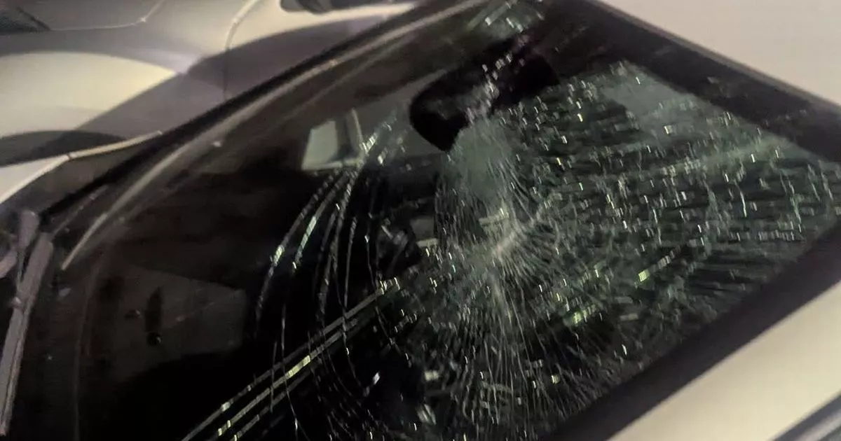 Storm Amy destruction as Mercedes windscreen smashed by flying bed