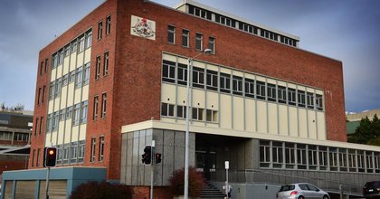 Tasmanian woman charged with trying to murder child remains silent in court