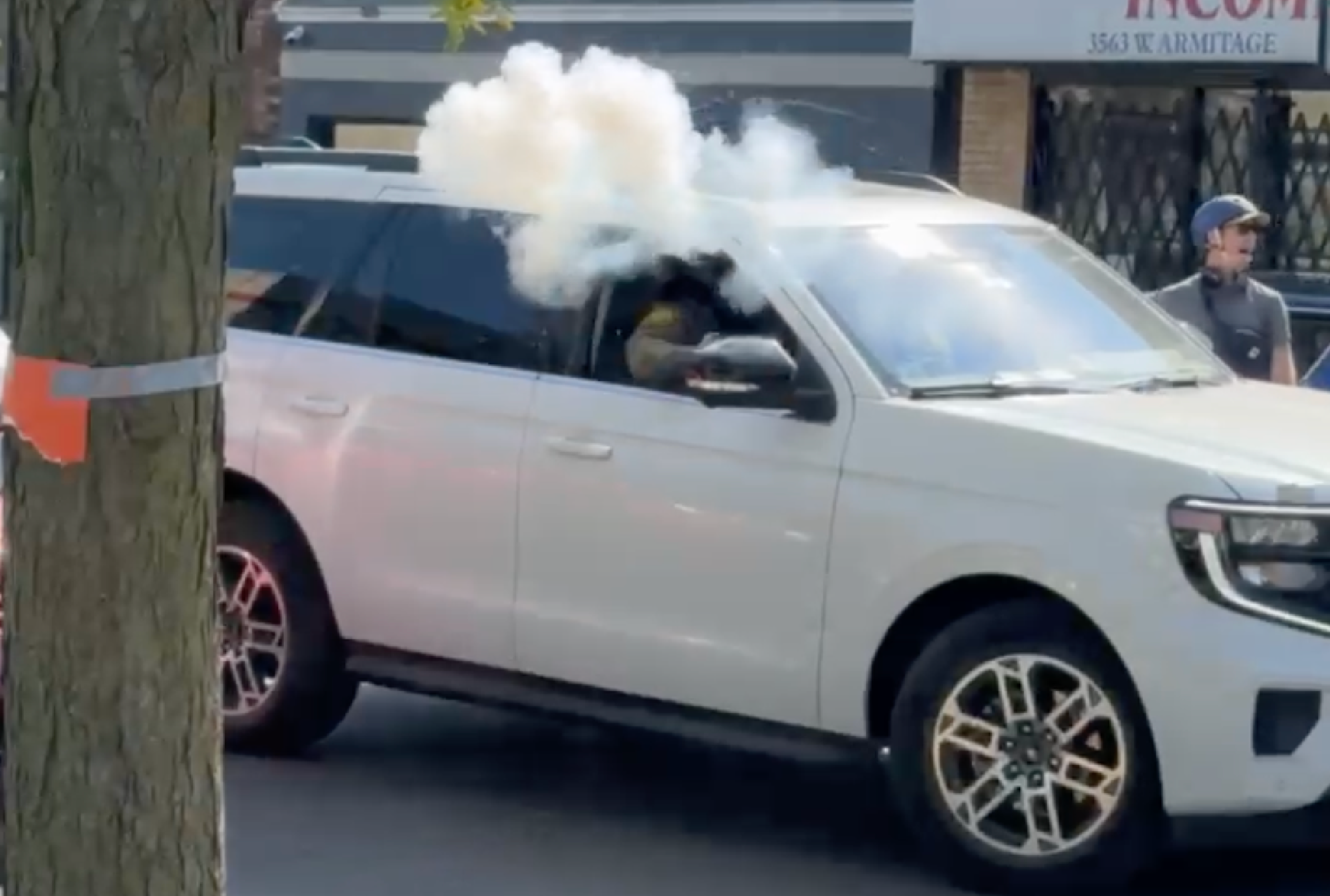 Family, Grocery Shoppers Run As Masked Agent Throws Smoke Bomb Onto Busy Chicago Street