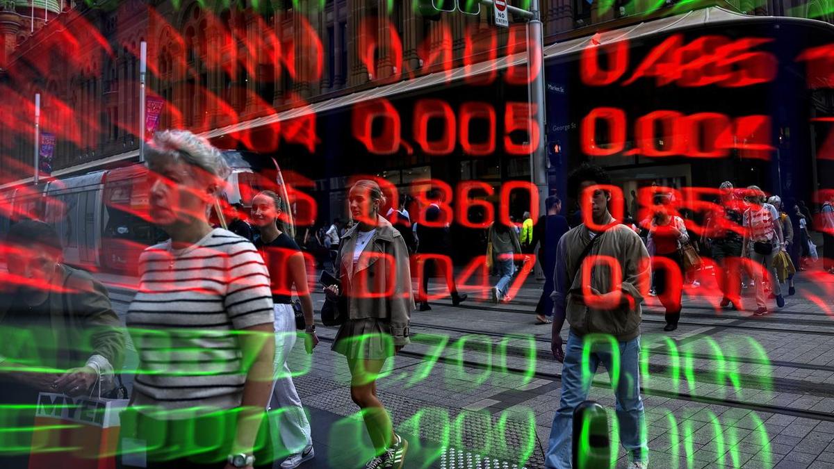 Aussie shares continue lower as rate hike worries weigh