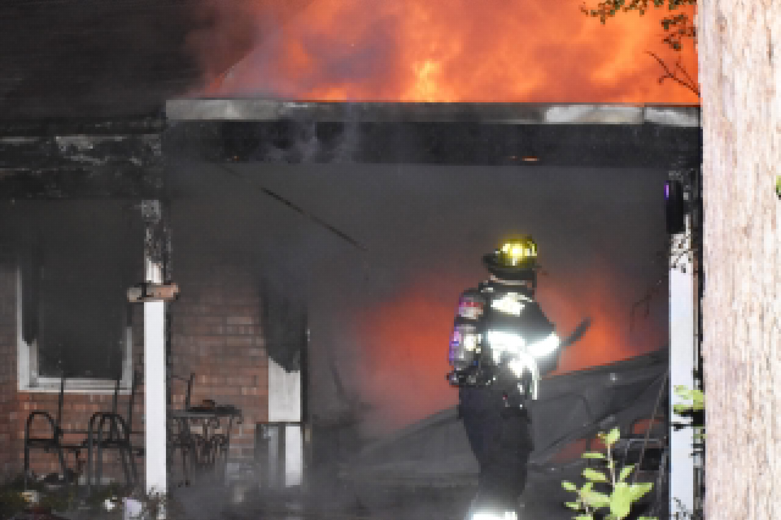 Residents displaced, cat dies after fire engulfs garage attached to house in Highland Park