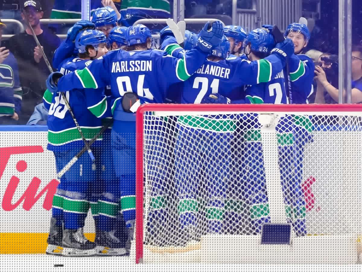 The Canucks coach hoping to sell hockey to India