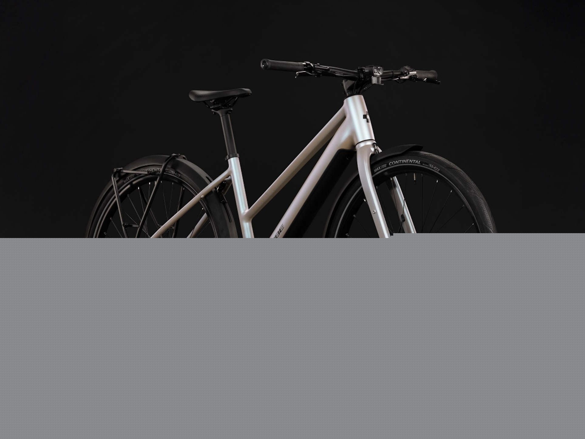 Affordable Cube e-bike features Bosch motor, carbon belt drive, and full equipment at 42.1 lbs