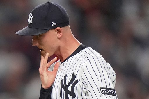 Boone defends his moves after Yankees bullpen falters again in playoff-opening loss to the Red Sox