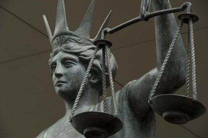 Killer locked up for life over murder of wife in fire