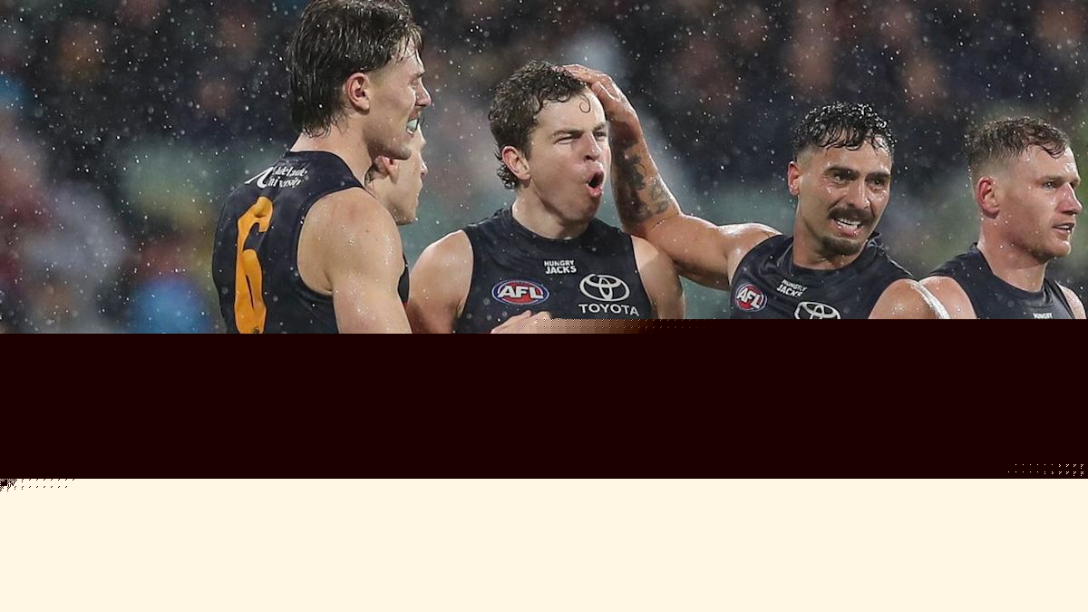 Crows survive scare from Tigers for narrow AFL win