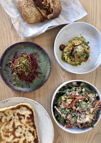 Woodbine Food Hall welcomes two new vendors, Caracas Dog and Marcato Kitchen