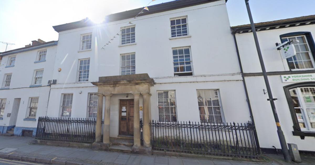 Axe-carrying man threatened to firebomb Powys village before hiding in school