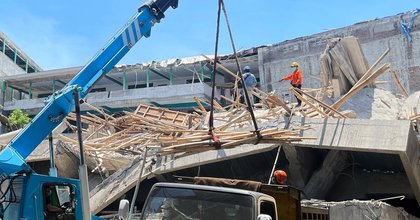 Rescuers use heavy machinery as hopes fade of finding school collapse survivors