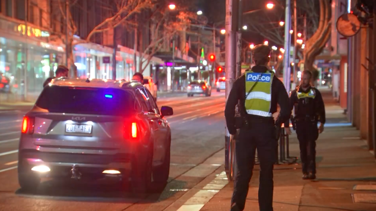 Man fighting for life after alleged stabbing 100m from Melbourne police station in South Yarra