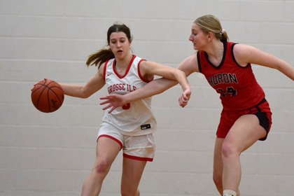 Late surge helps Grosse Ile girls hoops hang on for win at home vs New Boston Huron