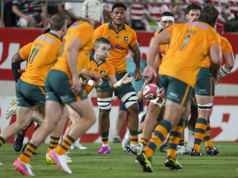 Wallabies defy Osaka red, scramble for Kiss debut win