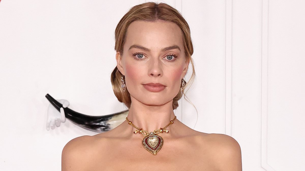 Margot Robbie stuns in Elizabeth Taylor's iconic necklace as she is joined by Jacob Elordi at Wuthering Heights premiere in LA