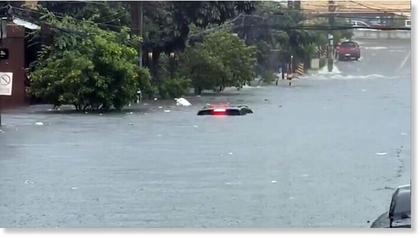 Parts of Metro Manila, Philippines flooded after heavy to intense rains - 4.7 inches in just an hour