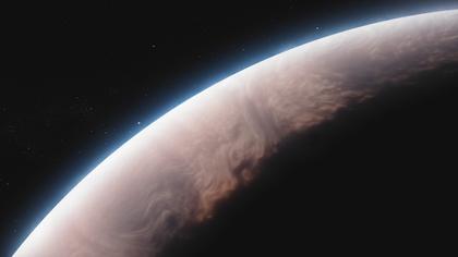Mists of tiny quartz crystals on a giant hot exoplanet
