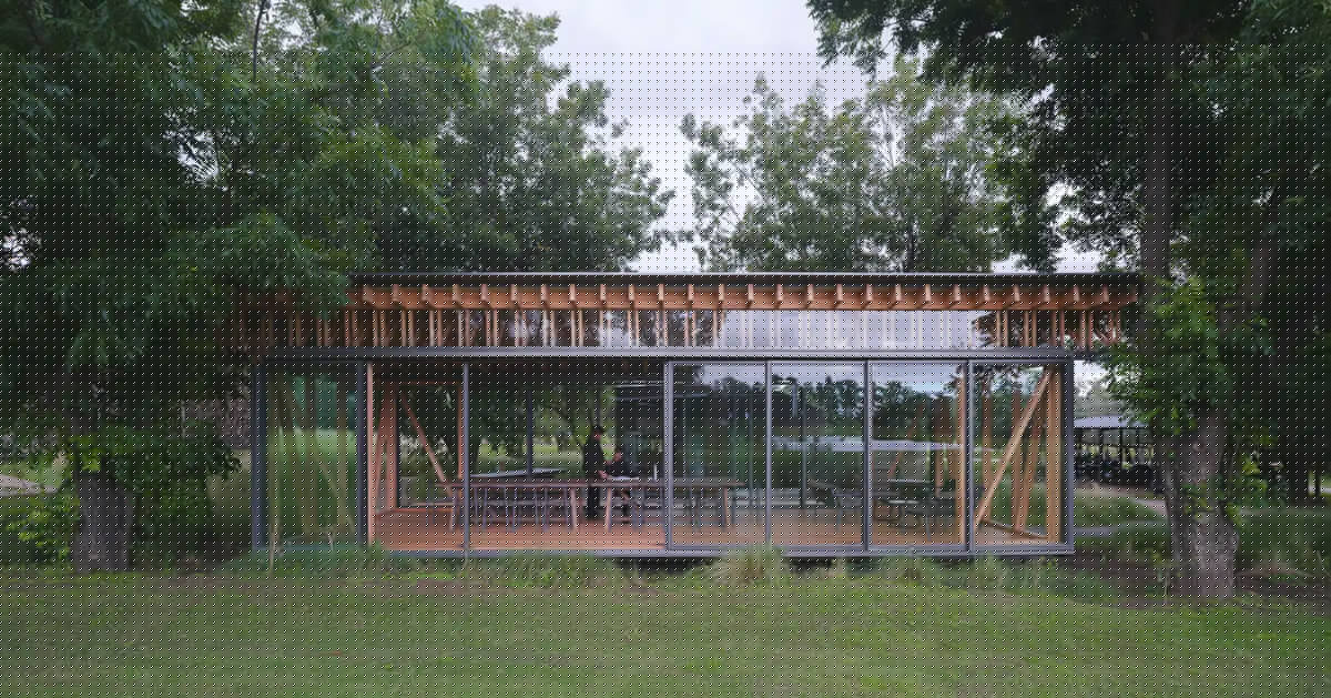 rhythmic timber and glass pavilion unfolds beneath pecan tree canopy in argentina