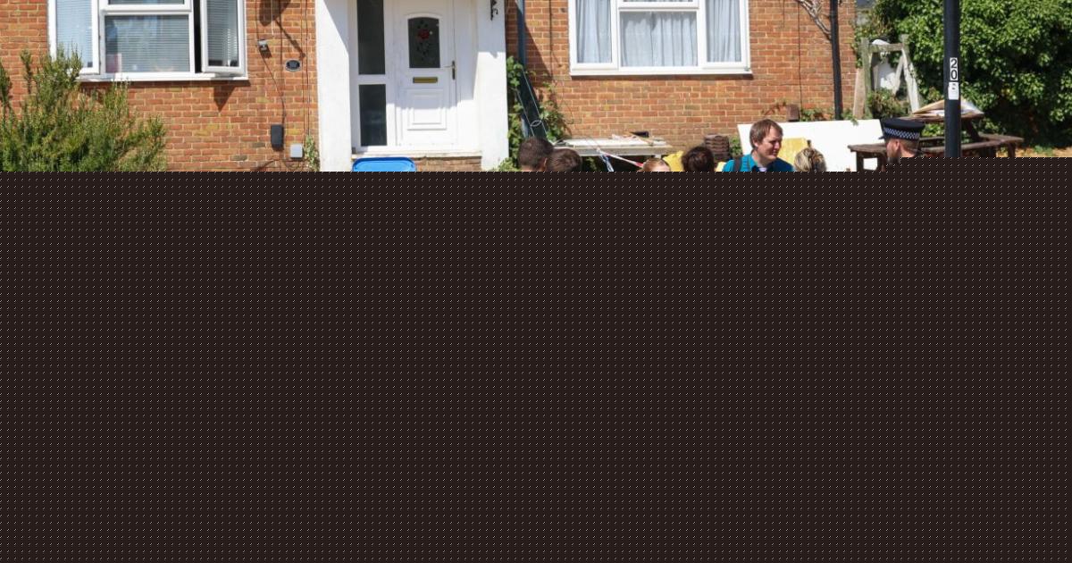 Police name man who died in attack at block of flats as murder probe continues