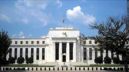 Federal Reserve keeps interest rates unchanged even as Trump continues to insist they be lowered