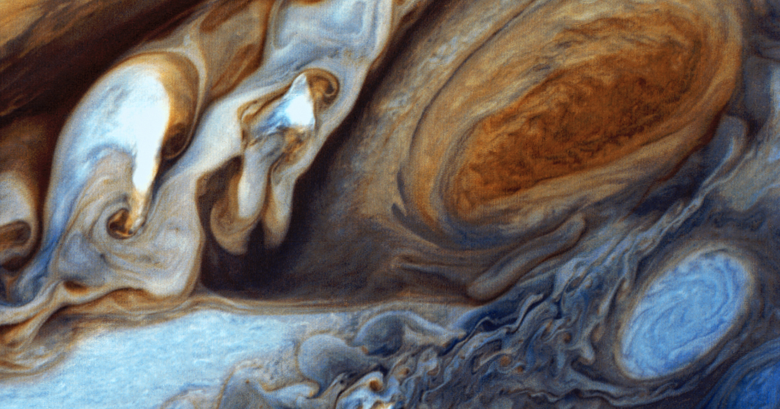 Jupiter has no ground to stand on at all — descend far enough into its atmosphere and there’s no solid surface waiting, only thickening gas that eventually behaves like liquid metal, a world where the very idea of “landing” stops making sense