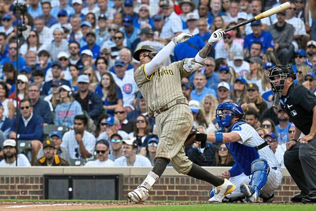 Manny Machado homers as Padres shut out Cubs to even wild-card series