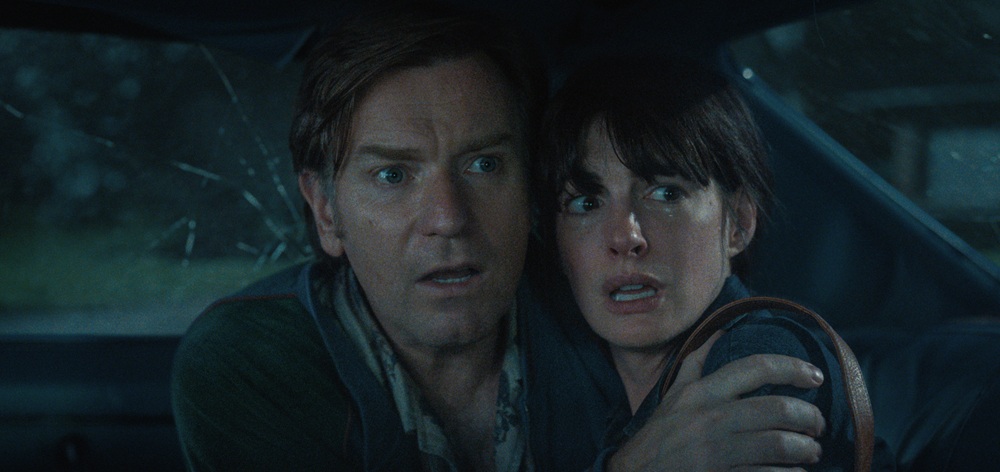Win a double to pass to see The End of Oak Street starring Anne Hathaway and Ewan McGregor