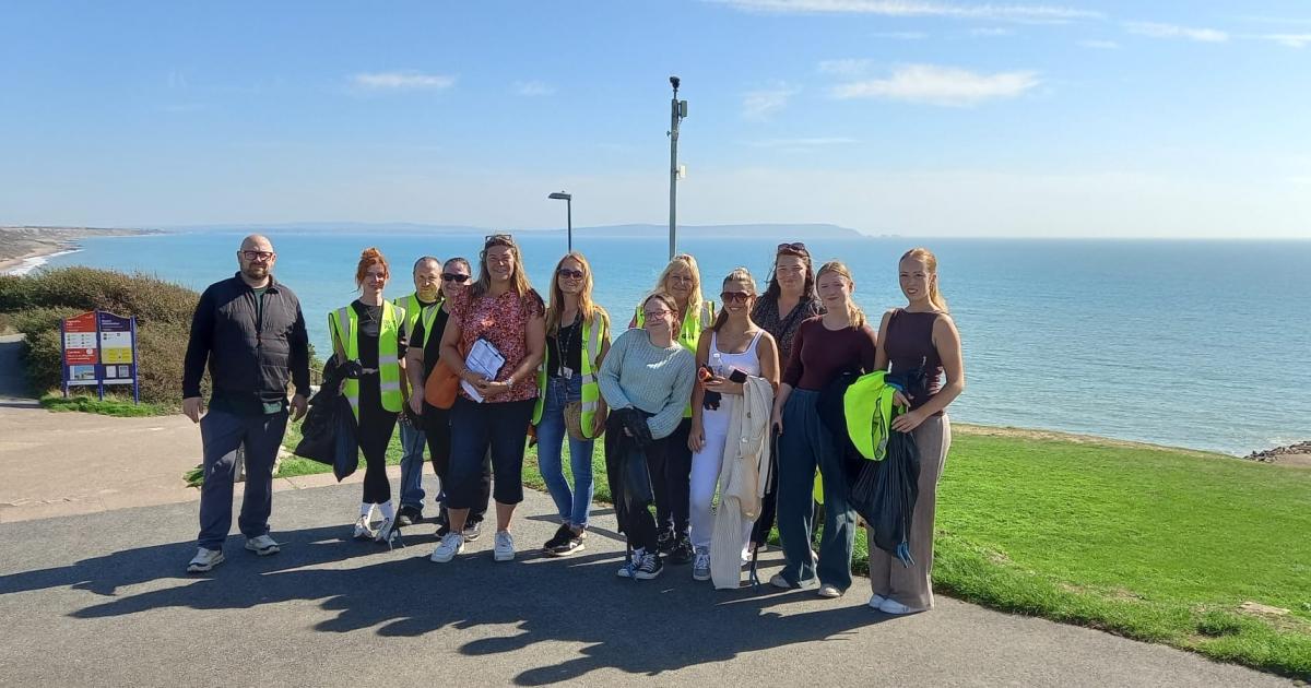 Team of staff tackle beach clean-up as part of national campaign