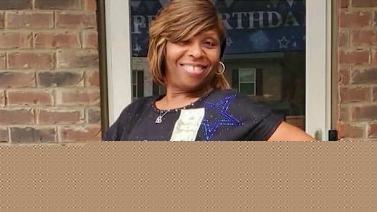 Who killed a woman shielding grandkids at East Point funeral home?