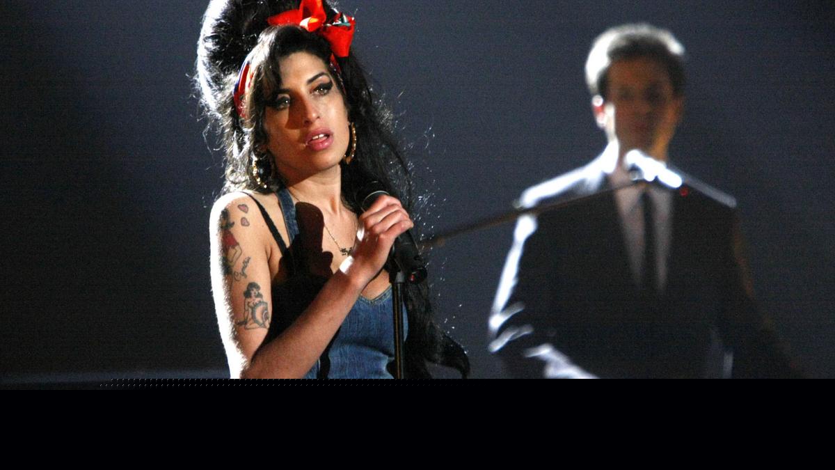 Amy Winehouse's dad ordered to pay £1m to singer's friends after losing court bid