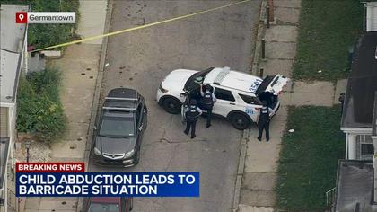 Man arrested after reports of child abduction lead to barricade