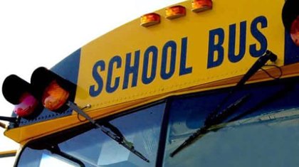 School bus hits woman at Auburn intersection
