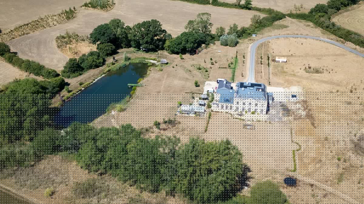 Sarah Beeny's £3m mini-Downton Abbey home is surrounded by an arid desert amid record drought (even though she DOESN'T have a hosepipe ban)