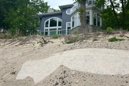Years after high water crisis, lax policies leave Michigan coast vulnerable