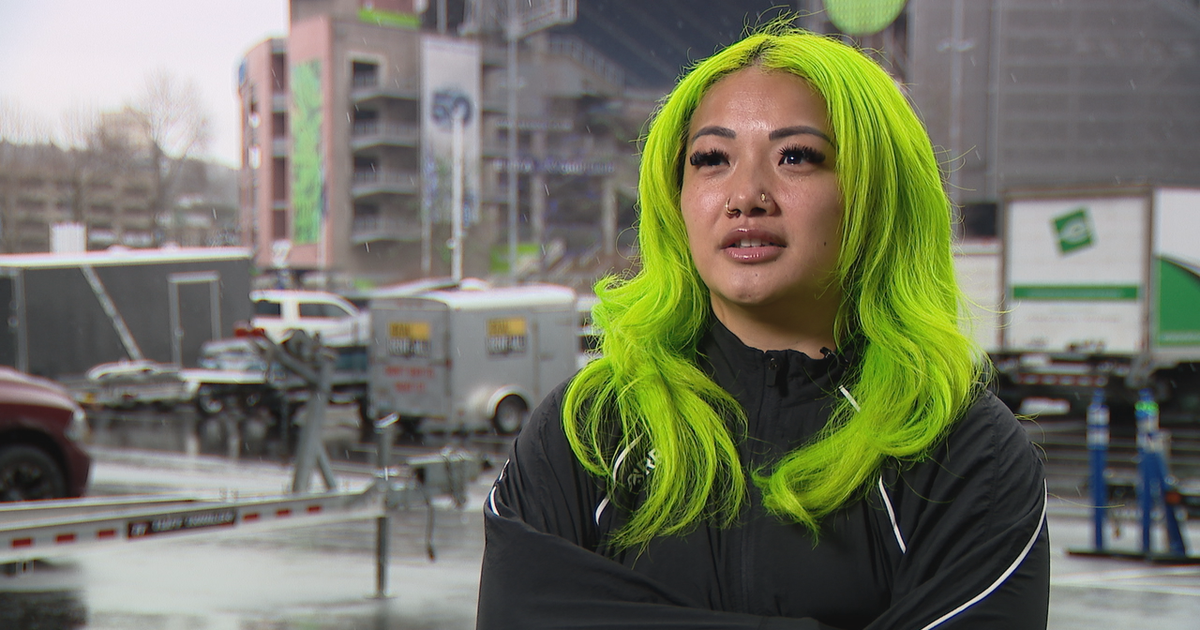 Who's the girl with green hair at the Seattle Seahawks game?