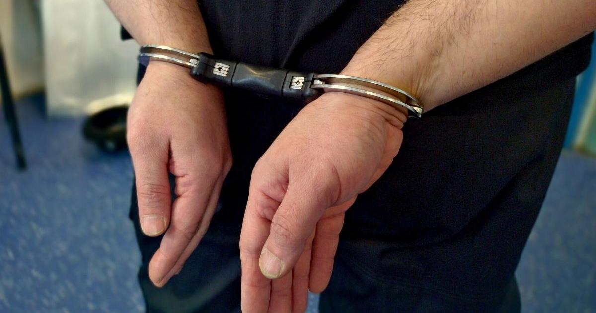 Man pushed woman onto glass table then later hurled abuse at police