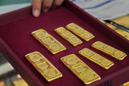 Gold hovers near $5,400, silver steadies as precious metals rally enters 'dangerous phase'