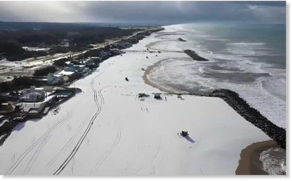Rare snow turns Argentina's Atlantic beaches white on June 30, for first time since 2013