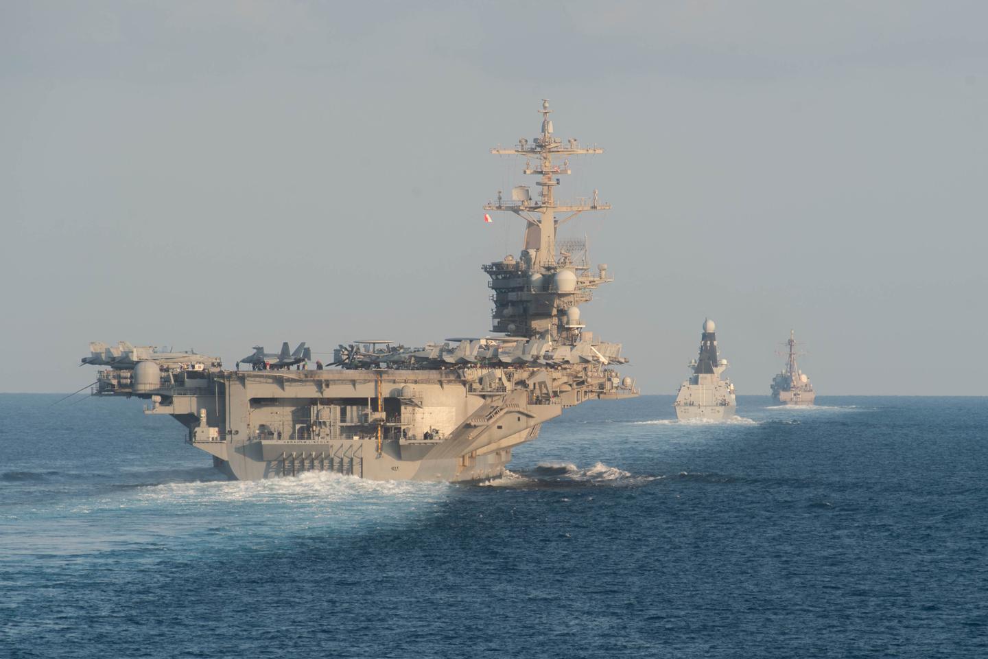 Trump ramps up pressure on Iran by deploying aircraft carrier and threatening strikes