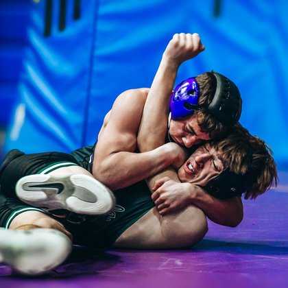 SPORTS: Wrestlers go to the mats, swimmers make a splash