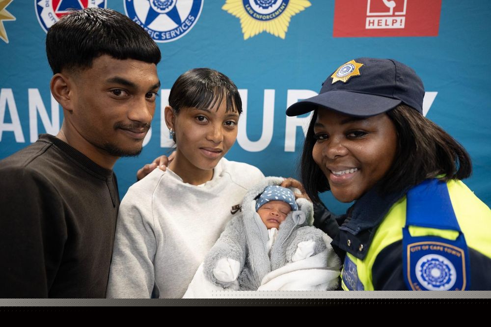 MOTHER OF THE NATION - Hero City officer reunited with boy she helped deliver