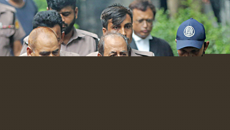 <a href="https://www.thedailystar.net/news/crime-justice/news/muzaffar-shown-arrested-ict-case-4231246" hreflang="en">Muzaffar shown arrested in ICT case</a>