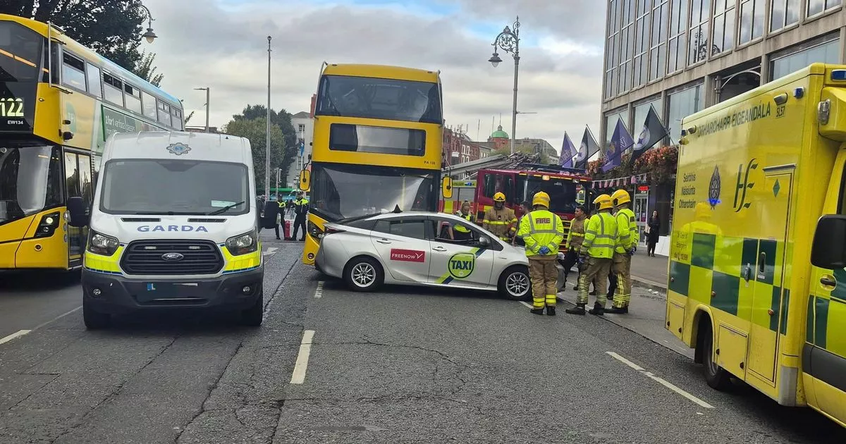 Three people rushed to hospital after bus and taxi collide in Dublin city centre