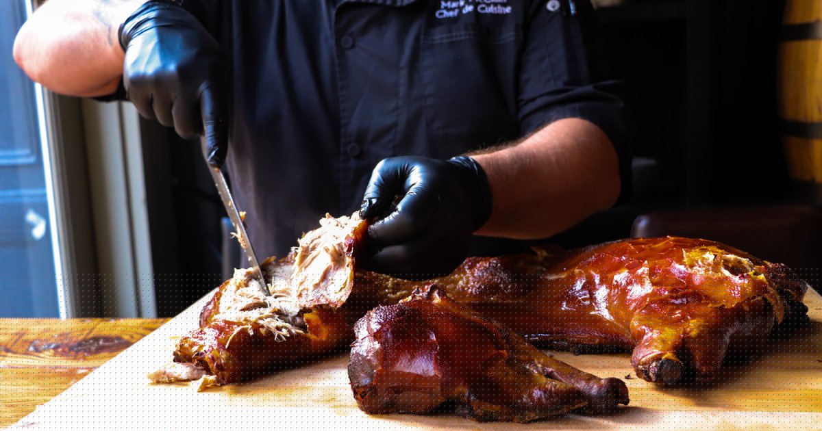 Amada's all-you-can-eat suckling pig dinner returns for two nights in August