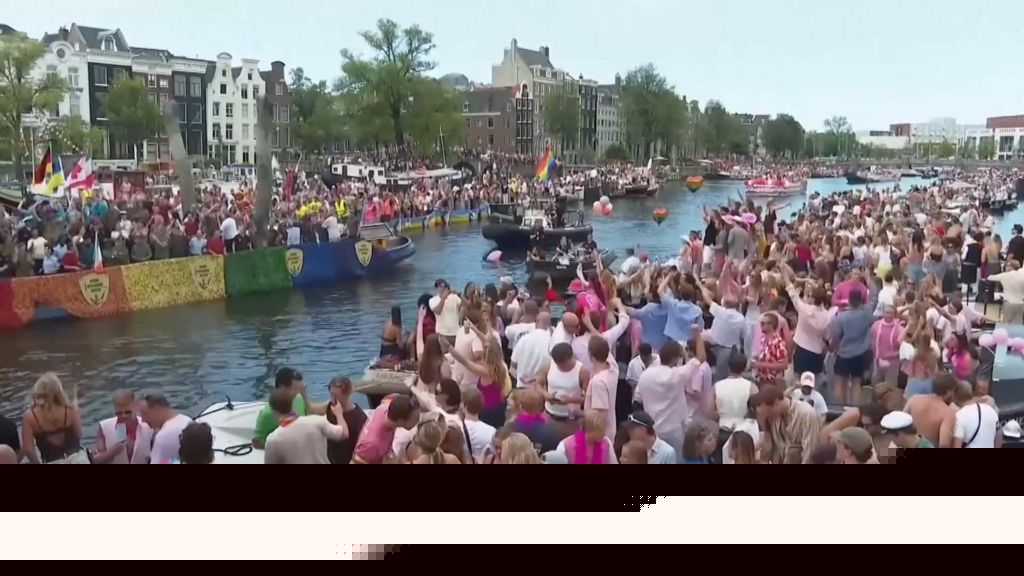 Crowds line Amsterdam's canals for Pride boat parade