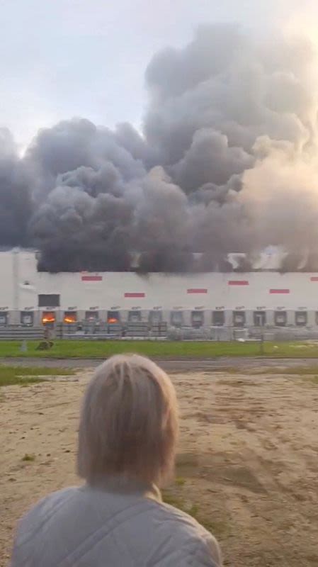 Ukrainian drones strike across Russia, hitting refineries, Wildberries warehouse